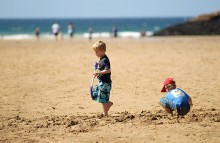 children-digging-on-beach